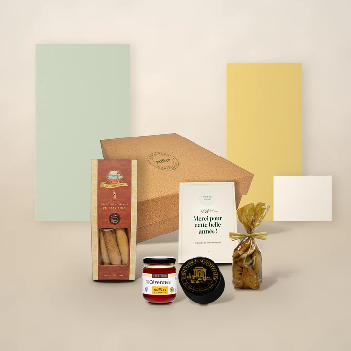 Coffret Clin d’œil : Miel des Cévennes IGP, Grisettes de Montpellier, Kémias aux olives noires, Zézettes de Sète, avec sa boîte kraft et la carte à votre logo