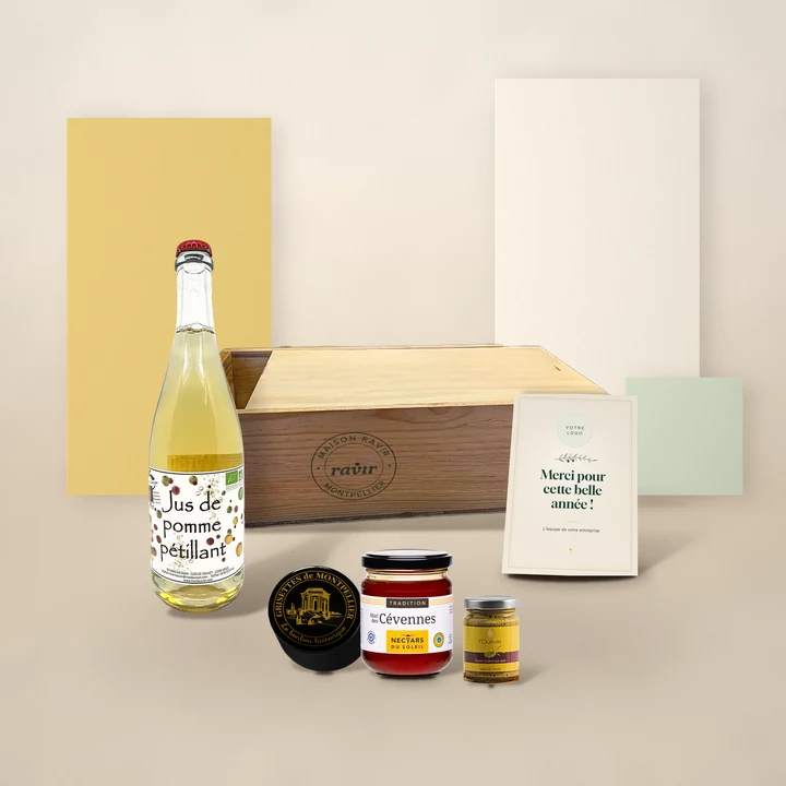 Coffret Escapade : Jus de pomme pétillant bio, Purée de Lucques verte, Miel des Cévennes IGP, Grisettes de Montpellier, avec sa caisse en pin et la carte à votre logo